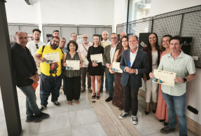 Premiados en el Rally Fotográfico 'Noche en Blanco 2026', junto a representantes institucionales.